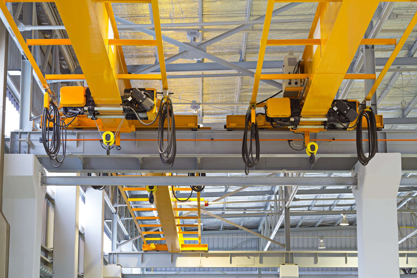 Conductor Bar vs. Festoon Systems vs. Cable Reels